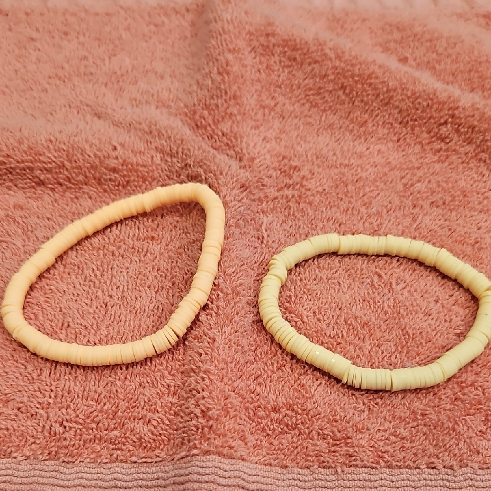 Women set of two bracelets, light, orange light.Yellow